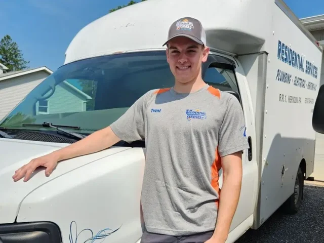 HVAC technician by work van